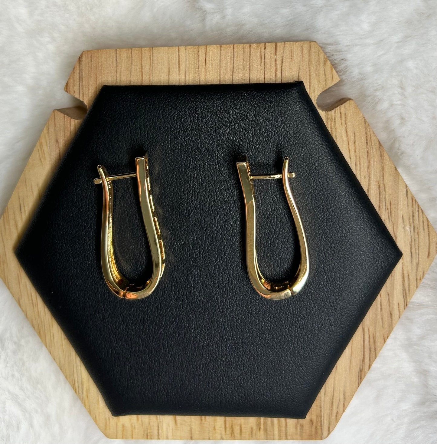 Gold plated hollow oval hoop earring!