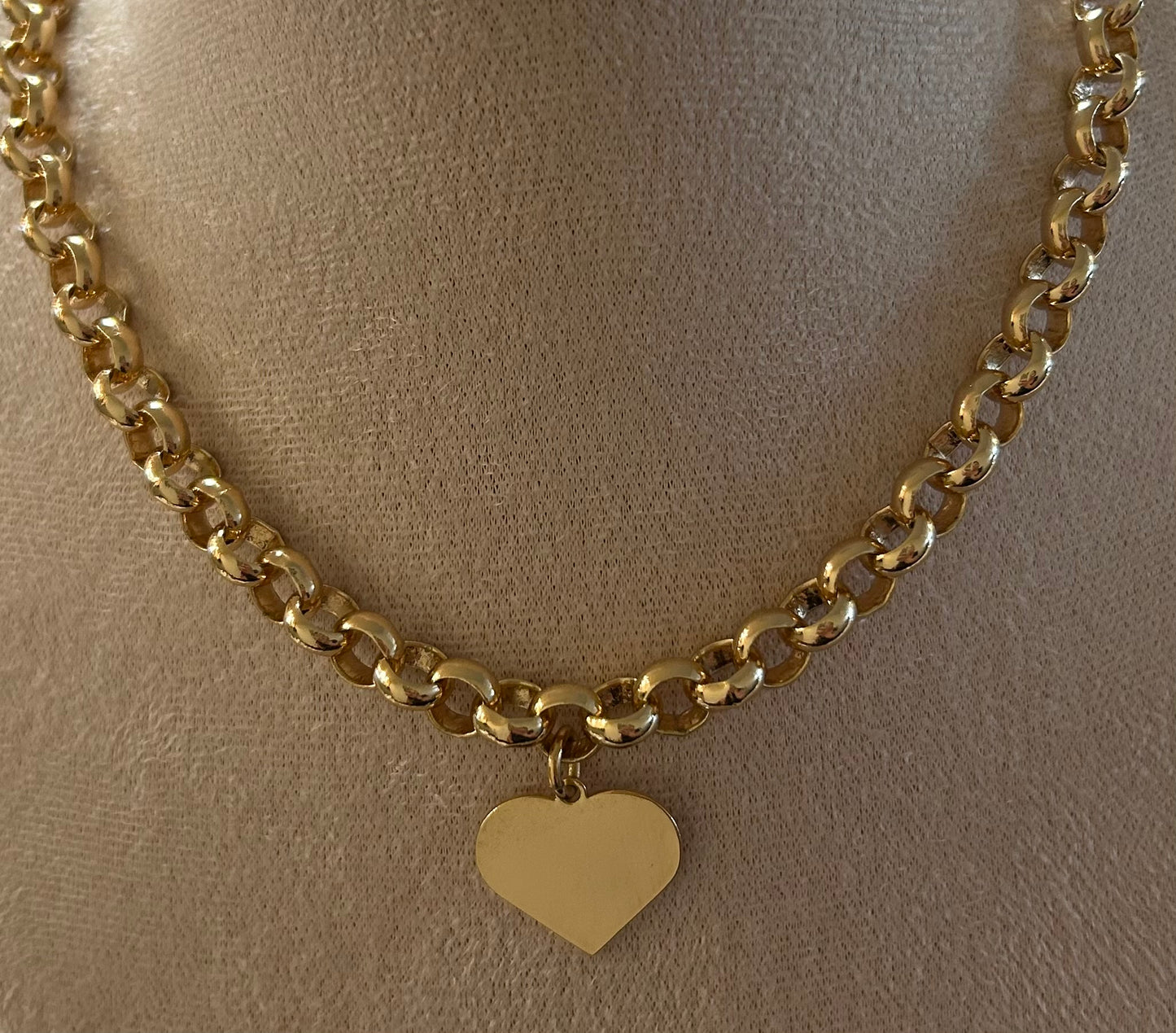 Chain with gold plated heart pendant.