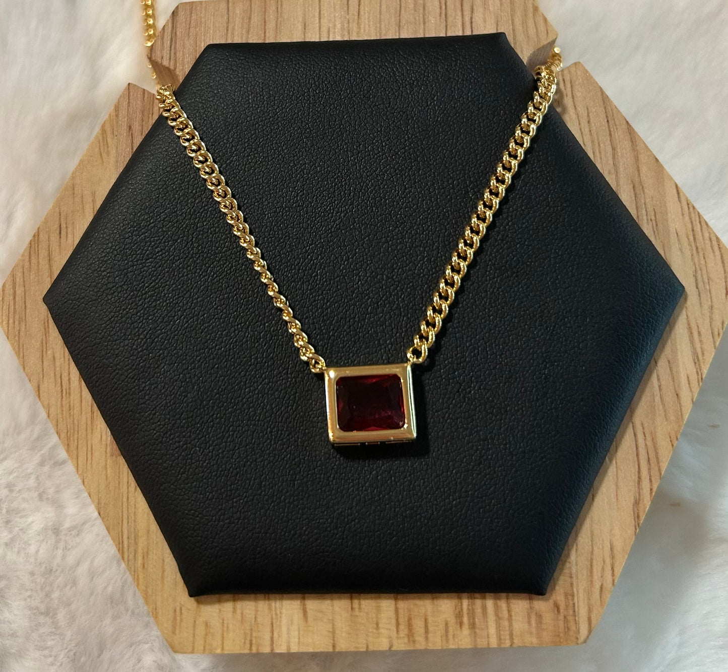 Chain with red gold-plated pendant