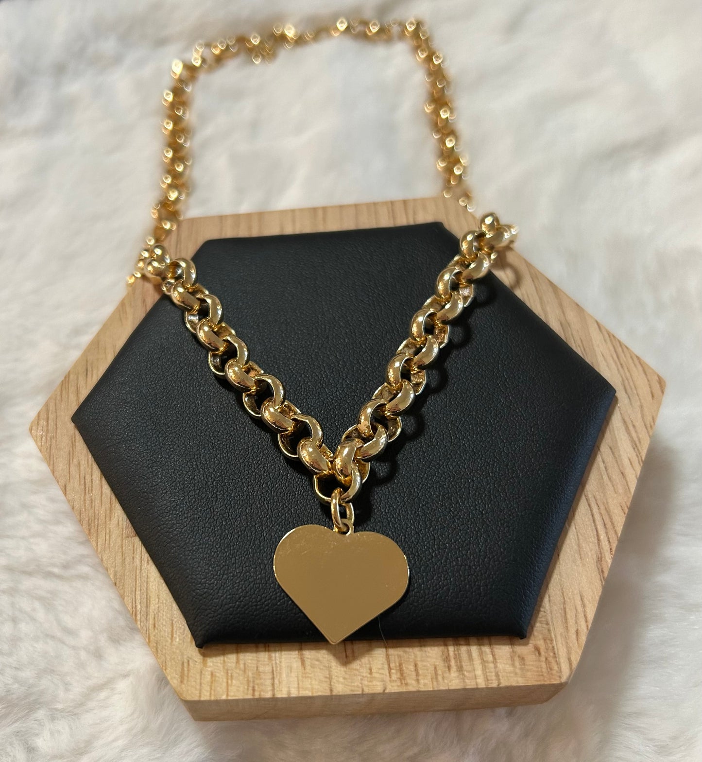 Chain with gold plated heart pendant.