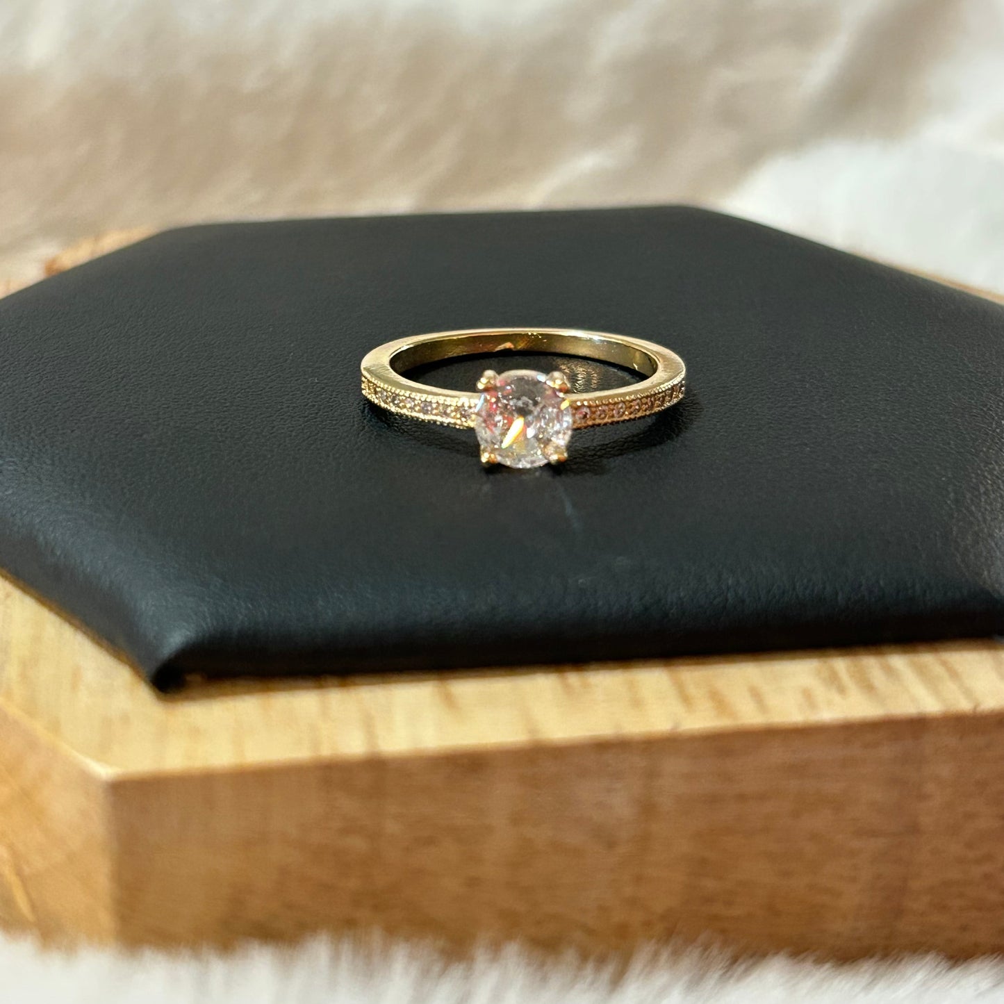 Solitaire ring with gold plated crystal size 7.5