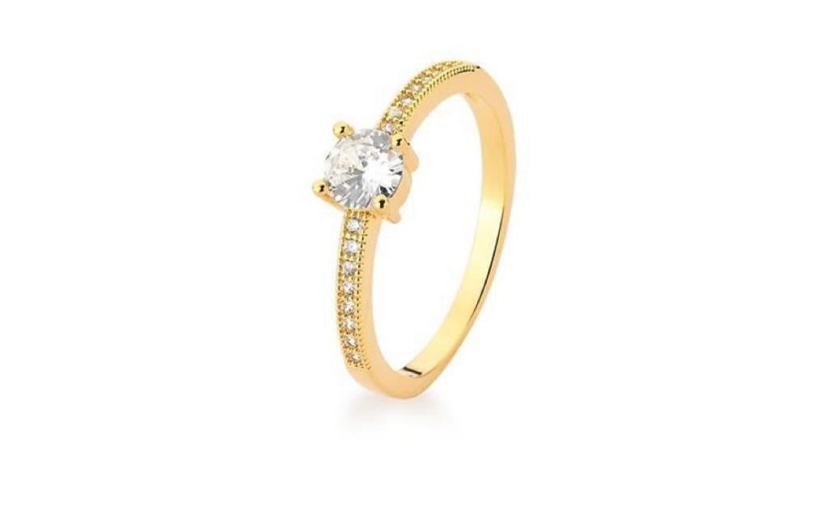 Solitaire ring with gold plated crystal size 7.5