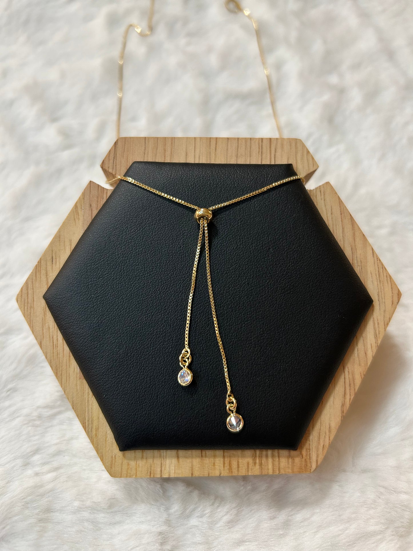 Tie chain with gold plated light point pendulum!